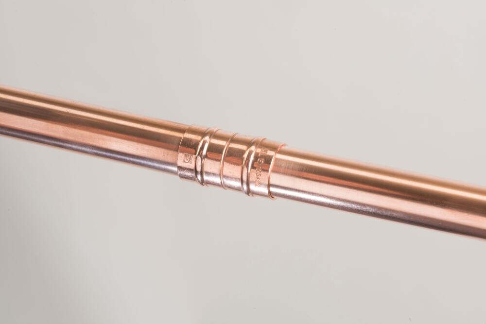 Installation showing a solder ring fitting assembled on the copper pipe